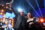 Генеральный директор телеканала &laquo;Пятница!&raquo; Николай Картозия и телеведущая Регина Тодоренко, ставшие лауреатами российской телевизионной премии &laquo;ТЭФИ&nbsp;- 2019&raquo; в&nbsp;номинации &laquo;Дневной эфир&raquo;, после церемонии вручения премии в&nbsp;Московском театре мюзикла